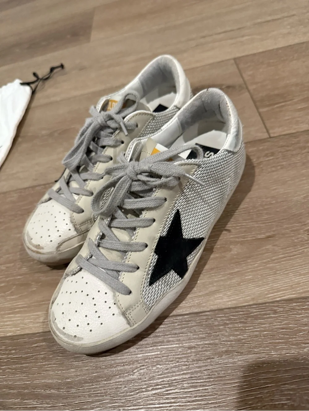 Golden Goose women’s White Sneakers with Black Star and Gray Laces